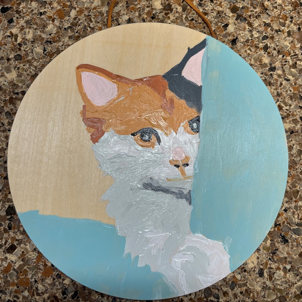 Hand painted by me round wood wall art plaque featuring Tortoiseshell cat